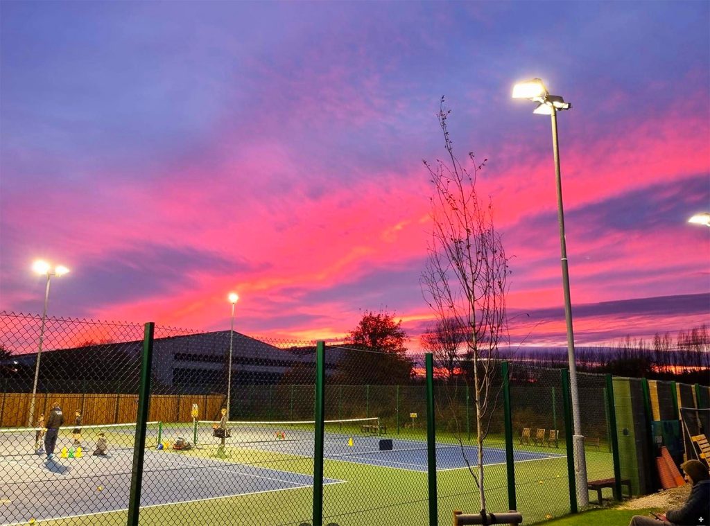 Tennis courts at night floodlit